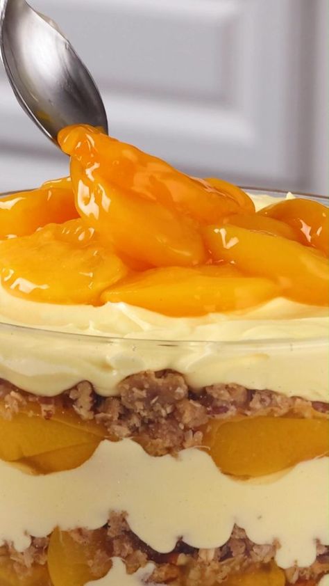 Whip up a new family favorite with a Peach Crisp Trifle. Lucky Leaf Fruit Filling or Topping makes this dish hassle-free and extra delicious. Peach Trifle, Summer Trifle, Trifle Bowl Recipes, Fruit Trifle, Lucky Leaf, Trifle Bowl, Peach Crisp, Trifle Desserts, Peach Desserts