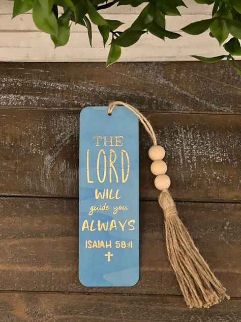 "Our \"The Lord Will Guide you ALWAYS\" ISAIAH 58:11 Bible verse bookmarks make excellent gifts, party favors, stocking stuffers, gifts to give to family, friends, pastures, and anything else you could think of.             These elegant wooden bookmarks with gold foil inscription come in various color options such as; weathered oak, distressed gray, light blue, sky blue, dark blue, coral pink, pink, lilac, purple, lime green, grass green, turquoise, and yellow.             We hope to inspire an Bookmarks For Bible Diy, Christian Handmade Gifts, Christian Acrylic Bookmarks, Diy Wooden Bookmark, Bookmark For Bible, Bible As A Gift, Diy Bible Bookmarks, Bible Bookmarks Diy, Faith Bookmarks