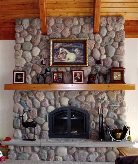 Fieldstone Fireplace by North Twin Builders, via Flickr Stone Wall And Fireplace, River Rock Chimney Exterior, Round Rock Fireplace, Corner Fireplace Makeover Stone, Stone Fireplaces With Mantle, Old Rock Fireplace Makeover, River Rock Fireplace Makeover, Riverrock Fireplace, Rock Fireplace Ideas