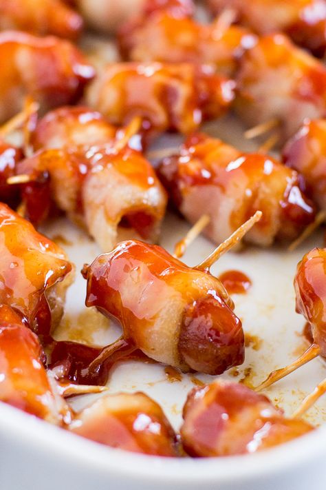 Bacon Wrapped Smokies are salty, sweet, and insanely addictive. The homemade barbecue sauce is just two ingredients and everything is baked to succulent perfection! Bacon Wrapped Bbq Chicken, Bite Size Appetizers Easy, Bbq Chicken Bites, Bacon Wrapped Water Chestnuts, Bacon Wrapped Smokies, Bacon Wrapped Chicken Bites, Bacon Wrapped Dates, Bacon Appetizers, Bite Size Appetizers