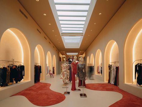 JUJU Studio creates flagship for Miss Circle in New York Fashion Boutique Interior, Fashion Showroom, Miss Circle, Architectural Lighting Design, Architecture Design Drawing, Hotel Apartment, Red Sofa, Beige Walls, Boutique Design