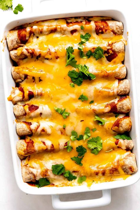 This Tex-Mex-inspired roasted vegetable enchiladas recipe is easy to customize with your choice of veggies, beans, cheese. Always a delicious vegetarian dinner recipe! | gimmesomeoven.com Vegetable Enchiladas, Veggie Enchiladas, Delicious Vegetarian Dinner, Vegetarian Enchiladas, Gimme Some Oven, Roasted Vegetable, Enchilada Recipes, Vegetarian Recipes Dinner, Delicious Vegetarian