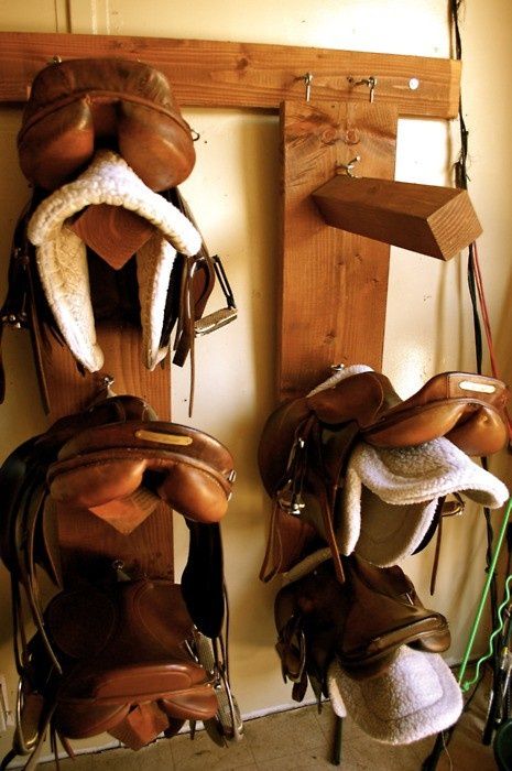 Saddle stands...I like....can be carried out and hooked on hitching post. Tack Room Organization, Horse Tack Rooms, Saddle Racks, Saddle Stand, Saddle Rack, Horse Barn Plans, Horse Facility, Dream Barn, Barn Design