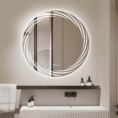 This simple and modern LED vanity mirror is designed for your premium bathroom. Two detached smart touch buttons are to control the LED lights and anti-fog of the mirror. This mirror is made of copper-free & environmentally friendly materials, which are corrosion free and makes the mirror more durable. Size: 24" x 24" Modern Mirror Design, Bathroom Mirror Design, Wall Mounted Makeup Mirror, Led Vanity Mirror, Bathroom Shelf Decor, Led Bathroom Mirror, Lighted Vanity Mirror, Makeup Vanity Mirror, Mirror Design Wall