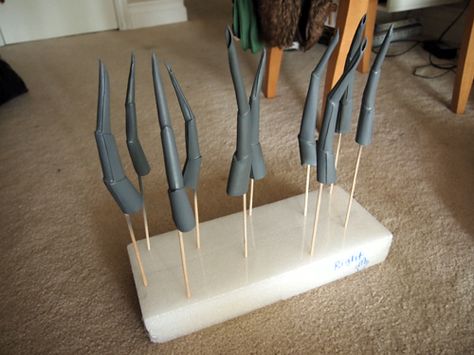 How to make Lady Deathstrike’s claw nails | Cosplay by Tiff Nguyen Cosplay Claws Diy, Claws Tutorial, Diy Claws, Nepeta Cosplay, Shadow Costume, Monster Spray, Kabob Sticks, Yellow Spray Paint, Lady Deathstrike