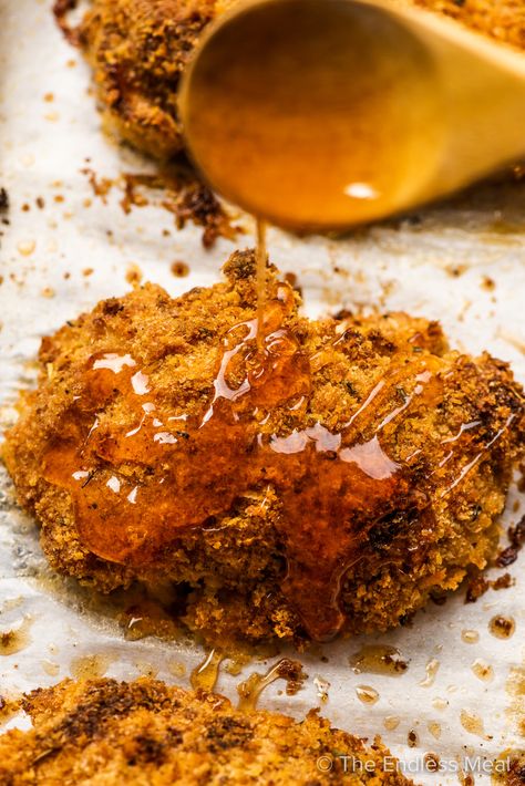 Hot honey chicken is the best chicken recipe around! The super crispy, oven-fried chicken is finished in sweet and spicy honey to make it unbelievably delicious. You will love it! #theendlessmeal #hothoneychicken #chicken #hothoney #popeyeshothoneychicken #nashvillehotchicken #spicychicken #sweetchicken #ovenfriedchicken #crispychicken #dinner #chickenrecipe #familymeal #refinedsugarfree Baked Hot Honey Chicken, Honey Chicken Breast, Best Chicken Recipe, Crispy Honey Chicken, Hot Honey Recipe, Cornflake Chicken, Chicken Oven, Hot Honey Chicken, Sweet And Spicy Chicken