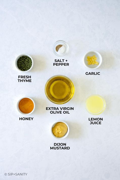 Discover the perfect easy dressing with our Lemon Dijon Vinaigrette recipe! Made with honey, fresh thyme, and garlic, it's not just for salad—use it as a marinade or drizzle on roasted veggies. Honey Garlic Salad Dressing, Honey Dijon Vinaigrette Dressing, Vinegarette Dressing Recipe, Lemon Honey Dressing, Lemon Garlic Vinaigrette, Dijon Vinaigrette Dressing, Lemon Dijon Vinaigrette, Honey Salad Dressing, Garlic Salad Dressing