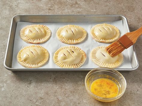 Hand pies or pie pockets. Whatever you call them, learn how to make these desserts from scratch. Strawberry Lemon Pie, Desserts From Scratch, Make Pie Crust, Pie Pockets, How To Make Pastry, Pie Crust Uses, Homemade Pastry, Dessert From Scratch, Strawberry Pie Filling