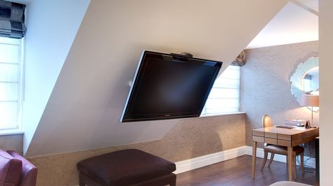 LB Loft Bracket Installed in a Hotel Attic Tv Room, Tv Stand Room Divider, Attic Bedroom Storage, Pitched Ceiling, Slanted Walls, Swivel Tv Stand, Ceiling Tv, Angled Ceiling, Angled Ceilings