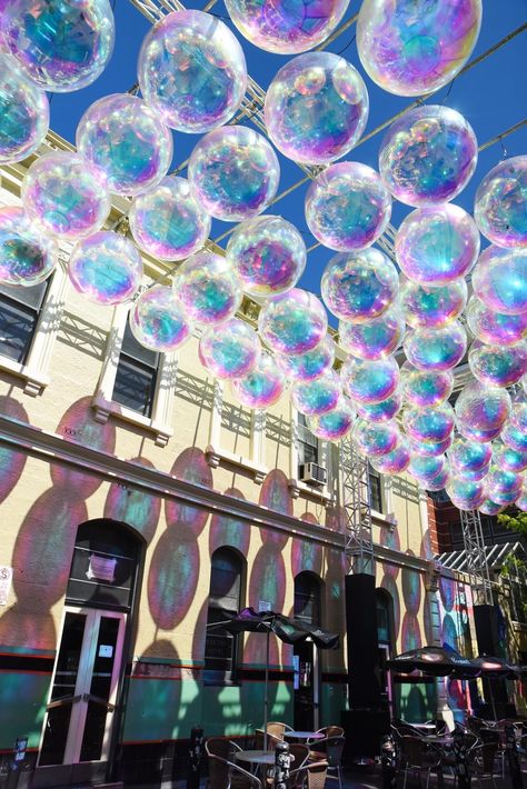 Experiential Art Installation, Bubble Installation, Holographic Party, Coachella Installations, Iridescent Stage Design, Venue Aesthetic, Coachella Art Installations, Immersive Retail Experience, Experiential Art