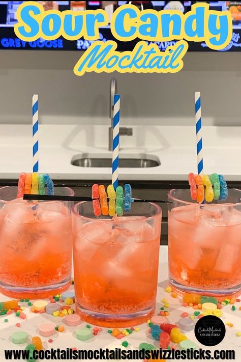 This image shows three red mocktails with sour candy scattered in front and as garnish in front of a brightly colored background Candy Drinks Alcohol Recipes, Candy Mocktail Recipe, Fun Kids Drinks, Alcohol Candy, Sour Drink, Mocktail Drinks, Candy Cocktails, Candy Drinks, Kid Drinks