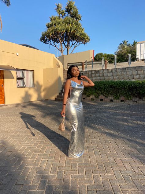 Chrome silver open back dress for baddies Silver Bday Outfit, 18th Birthday Long Dress, Silver Birthday Outfit Black Women, Silver Bday Dress, Silver Dress Outfit Black Women, Metallic Dress Outfit Silver, Silver Dress Birthday Outfit, Chrome Birthday Outfit, Silver Birthday Dress Black Women