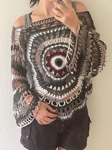 Done by @edanajoy on insta Inspired by @carolinemoorenc on insta. Grungy Crochet, Witchy Crochet Sweater, Crochet Sweater Dark, Witchy Crochet Ideas, Crochet Grunge Sweater, Crochet Eyeball Sweater, Crochet Eyeball Cardigan, Circle Crochet, Crochet Eye Cardigan