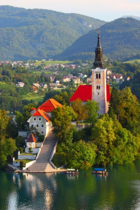 Bled is Slovenia’s most popular tourist resort and understandably so. Picturesque and pristine, the lake was formed when the Bohinj glacier met a huge body of rock, what is now known as Bled Island and the only island in Slovenia.

Having carved the island, the glacier melted into the lake that we see today. The most recognisable symbol of Bled is the Church of the Mother of God on the lake’s island, originally built in 1465. Plitvice National Park, Glaciers Melting, Dump Trucks For Sale, Train Tour, Lake Bled, Italy Tours, Jules Verne, Beautiful Castles, Scenic Views