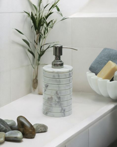 Elevate your bathroom aesthetic with our fluted Banswara Marble Soap Dispenser. Dimensions - 7” Weight - 0.95 Kgs #marbledispenser #soapdispenser #marblehandicrafts #bathroomessentials #homedecor #StoneSymmetry #banswaramarble Shop now: www.stonesymmetry.com (Marble Soap Dispenser, Bathroom essentials, Banswara Marble, Stone Symmetry, Marble handicrafts) Soap Dispenser Bathroom, Marble Soap, Bathroom Aesthetic, Marble Stone, Bathroom Essentials, Soap Dispenser, Marble, Soap, Shop Now