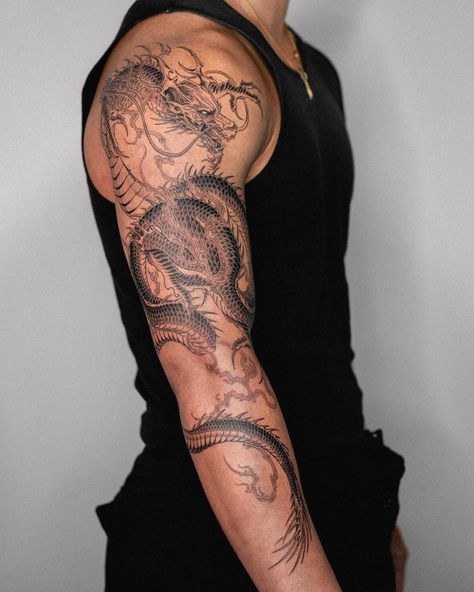 Sleeve Tattoos Men Aesthetic, Men’s Dragon Tattoo Arm, Mens Dragon Sleeve Tattoo, Back Tattoo Tiger For Men, Dragon Tattoo Wrapped Around Arm Men, Chinese Dragon Tattoos Shoulder, Upper Arm Tattoo Men Japanese, Max Holloway Tattoo, Arm Dragon Tattoo Men