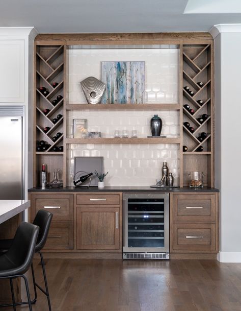 Custom built in with open wine storage cabinets, beverage fridge, and open floating shelves Dry Bar With Wine Storage, Beverage Center Cabinet, Tall Wine Fridge Wet Bar, Wine Built In Wall, Built In Dry Bar Nook, Kitchen Servery Ideas, Wine Shelving Ideas, Wine Storage Built In, Wine Bar Home Ideas