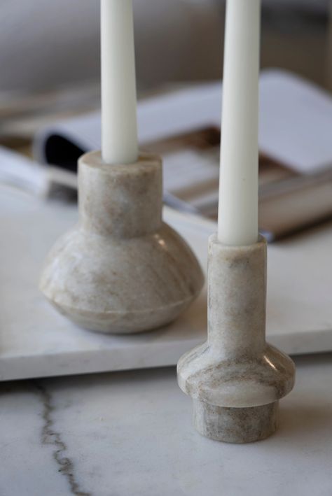 Introduce a sleek, modern element to your decor with our Contemporary Marble Taper Candle Holder. Crafted from high-quality marble, this candle holder features a distinctive, elongated design that combines a minimalist aesthetic with timeless elegance. The natural stone finish boasts subtle veining and color variations, making each piece uniquely beautiful.This holder is designed to securely accommodate a standard taper candle, providing a perfect elevation to enhance the candle's visibility and Candle Holder Clay, House California, Marble Products, Clay House, Marble Candle Holder, Marble Candle, Taper Candle Holder, Clay Houses, Taper Candle Holders