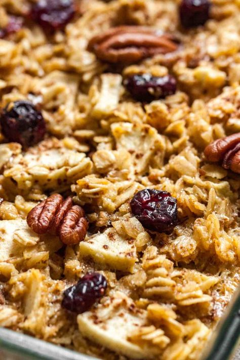 Baked Oatmeal made with apples, pecans, and cranberries is a delicious and comforting breakfast casserole that can be made ahead! This easy recipe is perfect for the holidays and will surely become a new fall and winter favorite. #breakfast #oatmeal #thanksgivingrecipes #comfortfood Oatmeal Breakfast Casserole, Oat Biscuits, Oatmeal Biscuits, Breakfast Casserole Recipes, Baked Apple Oatmeal, Oatmeal Healthy, Pecan Crumble, Oat Breakfast, Baked Oatmeal Healthy