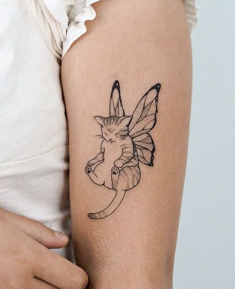 #Welcome to our curated collection of stunning cat tattoo designs that are bound to leave you in awe. In this article, we are excited to unveil the most incredible feline ink art that showcases the beauty and grace of our beloved feline companions. These cat tattoos not only capture the essence of these enigmatic creatures but also serve as a testament to the artistic prowess of the tattooists behind them. Whether you're a cat lover or simply appreciate exquisite body art, prepare to be amazed b 2 Cats And A Dog Tattoo, Cute Matching Tattoo Ideas, Cat Design Tattoo, Tattoo Ideas On Arm, Tattoo Gato, Tatuaje Studio Ghibli, A Small Tattoo, Kitten Tattoo, Tattoo Couple