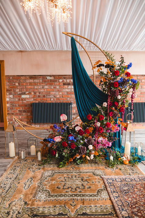 Crescent moon altar decoration with colourful wedding flowers and teal drapery with candles in lanterns for tarot inspired wedding | altar decor | wedding theme ideas | gothic wedding | Alex Bates Photography Spring Witch Wedding, Diy Witchy Wedding Decorations, Moon Altar Wedding, Witchy Summer Wedding, Moon Wedding Backdrop, Witchy Wedding Theme, Gothic Wedding Theme Ideas, Esoteric Wedding, Arch Ideas For Wedding