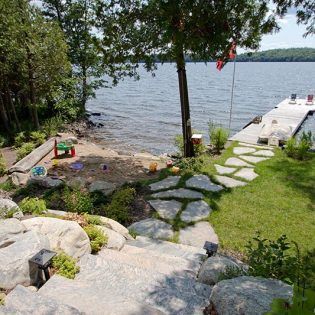 Gallery - Lakeside Landscaping - Muskoka Landscaping Contractor Lakeside Landscaping, Nautical Landscaping, Lake Landscaping, Lakeside Garden, Sloped Backyard Landscaping, Cottage Backyard, Lake Houses Exterior, Lake Dock, Sloped Backyard