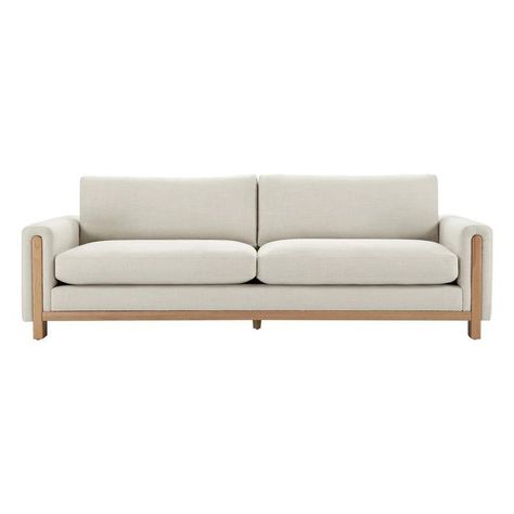 The original wood's warm, natural hue traces a harmonious H-shape, masterfully outlining the sofa's silhouette. Its clean lines, astutely juxtaposed with gentle curves, skillfully defy rigidity, offering a visual harmony that is nothing short of captivating. Fixed solid Ash wood base features a natural finish. Pillowy-soft cushions are padded with a soft blend of fiber and sterilized feathers. All cushions are loose and reversible with zip-off covers. Cushions can be easily fluffed to maintai... Sofa With Wood, Black Friday Furniture, Green Couch, Modern Leather Sofa, White Couches, Brown Sofa, Sofa Upholstery, Exposed Wood, Perfect Harmony