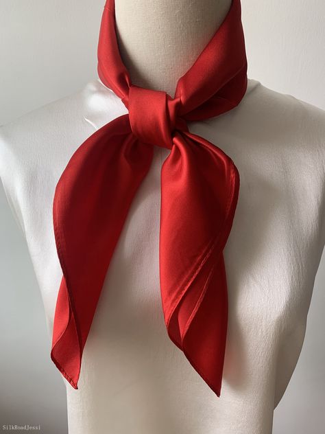 Luxurious natural mulberry silk medium square scarf, color red, size: 65 cm x 65 cm / 26 in x 26 in. Soft, smooth, and lustrous silk charmeuse fabric, breathable and skin-friendly feels very soft and comfortable to wear. Can wear it on both sides which will give different feel and look. Can style in many ways: you can wear this scarf as a soft neck scarf, as a hair tie, as a headband scarf, as a wrist scarf, as a purse accessory. Or style it in any way you want with your own sense of creativity! Suitable for all seasons and is a great gift idea for special occasions. Care Instructions: Pure silk is a type of organic, natural and delicate fabric, please avoid washing. Dry clean recommended. Stored in a cool, dry, and dark place. To smooth out wrinkles and creases naturally, you may hang the Neck Scarf Tie, Red Scarf Aesthetic, Neck Scarf Styles, Red Neckerchief, Red Scarf Outfit, Red Neck Scarf, Red Head Scarf, Man Scarf, Scarf Aesthetic