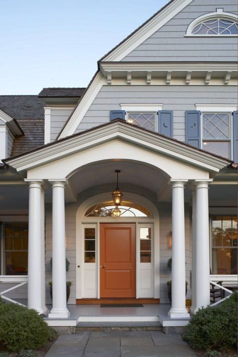 This beautiful Dutch Colonial home was designed for a family of five by Mackin Architects, located in the coastal community of Rye, New York, on the Long Island Sound. Rustic Stone Fireplace, Dutch Colonial Homes, Colored Dining Chairs, Garage Door Types, Colonial Home, Long Island Sound, New York Homes, Dutch Colonial, Traditional Fireplace