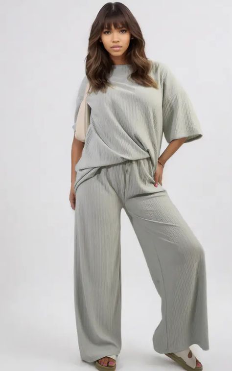 Say hello to comfy chic with the Daniela Ribbed Oversized Top and Drawstring Wide Leg Trouser Co-ord Set! This set is perfect for those laid-back days when you still want to look stylish. The oversized top and wide-leg trousers with a drawstring make it easy to wear and super cozy. Ready to rock this effortless look? Trouser Co Ord, Comfy Chic, Back Day, Oversized Top, Co Ord Set, Look Stylish, Co Ord, Wide Leg Trousers, Say Hello