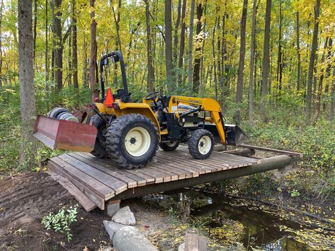 Creek Ideas, Bridges Over Creeks, Atv Bridge Over Creek, How To Build A Garden Bridge, Diy Creek Bridge, Creek Bridge, Diy Bridge Over Creek, Creek Bridge Ideas, Bridge Diy