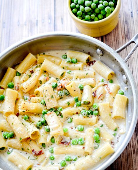 Rigatoni pasta with a creamy Afredo sauce and tossed with bacon and peas makes an easy weeknight dinner for all. Fall Lunches, Pasta With Peas And Bacon, No Bake Pumpkin Cheesecake Bars, Alfredo With Bacon, Pasta And Peas, Peas Bacon, Peas Pasta, Bacon Peas, Bacon Alfredo