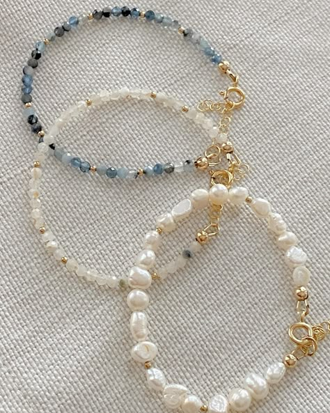 Getting up close and *pearl*sonal with these bracelets – which is your favorite? 🤍  Made with freshwater pearls and real 3mm gemstone beads; the perfect accessory to layer, stack, or wear solo.  The gemstone bracelets come in aquamarine, moonstone, and pink opal for a pop of color; and they pair so well with the pearls and golden paperclip chain bracelet; which you can find in the ‘perfect for stacking’ collection on the site! 💻  . . . .  #pearlbracelet #pearljewelry #handmadejewelryshop #oce... Moonstone Beaded Bracelets, Bead Making Aesthetic, Homemade Pearl Jewelry, Jewelry Accessories Handmade, Cute Bracelet Stacks, Beaded Bracelets With Words, Pearl Bracelet Ideas, Bracelets Diy Beads, Cute Beaded Bracelets