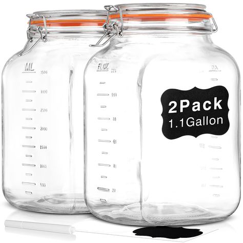 PRICES MAY VARY. Super Wide Mouth: Mouth size: 4.3in/10.9cm, this glass mason jar with a wide opening, It’s wide enough to put a 1 measuring cup in it, also It's easy to reach in and take food or scrub the bottom With Tick Marks: The Cookie jars with fluid ounce (american unit of capacity) and millimeter(international volume unit), no need to use a measuring cup, more convenient to measure Airtight Leak-proof Lid: The hinged lid and the silicone gasket are tightly matched to provide a double sea Gallon Glass Jars, Sun Tea, Large Mason Jars, Jars With Lids, Glass Jars With Lids, Clear Glass Jars, Glass Storage Jars, Wooden Tags, Glass Mason Jars