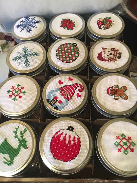 Christmas candy jars I made for my staff. They loved them and I loved making them! Ideas For Mason Jars, Cross Stitch Gift Ideas, Stitch Gift Ideas, Jar Cross Stitch, Christmas Bazaar Ideas, Mason Jar Lids Ornaments, Christmas Candy Jars, Christmas Bazaar, Bazaar Ideas