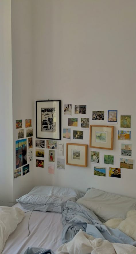 Photo Wall Collage Without Frames, Wall Behind Bed Decor Ideas Aesthetic, Minimalist Photo Wall Bedroom, Bedroom With Prints On Wall, What To Do With A Plain Wall In Bedroom, Ledge Decorating Ideas Bedroom, Diy Above Couch Wall Decor, Tilted Walls Bedroom, Decorate Walls In Bedroom