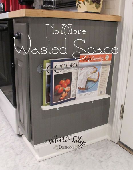 Keep food magazines handy by installing a holder on side cabinets or an island. This area is too low to store items you use regularly, but is great for items that might otherwise get lost in the shuffle. Skjulte Rum, Modern Vintage Homes, Spice Containers, Plastic Bins, Tulip Design, Cabinet Space, Magazine Holders, Vertical Storage, Storage Hacks