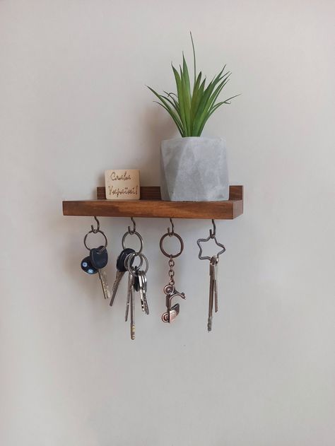 We are working. And send orders in 2-3 days. Each of us has faced the problem of finding keys from home, garage, office, car... And there is always a feeling that the more late you are, the harder it is to find. We offer a simple solution of this problem. Our keyholder is made by hand from natural wood, the product is equipped with quality fittings. The keychain is functional, convenient and easy to install. Each product is covered with safe water-based paint and matt varnish. You can choose a c Entryway, Hanger Design, Key Holders, Key Organizer, Key Hanger, Key Hooks, Key Holder, The Wall, Ships