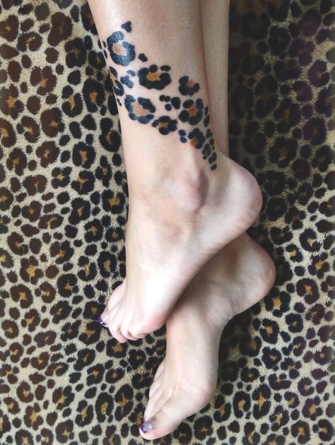 Leopard Spots Represented In Tattoos: Meanings and Symbolism Leopard Print Tattoos For Women, Cheetah Spots Tattoo, Cheetah Print Leg Tattoo, Leopard Skin Tattoo, Jaguar Print Tattoo, Animal Print Tattoo For Women, Leopard Print Tattoo For Women, Leopard Print Tattoo Sleeve, Cheetah Print Tattoo