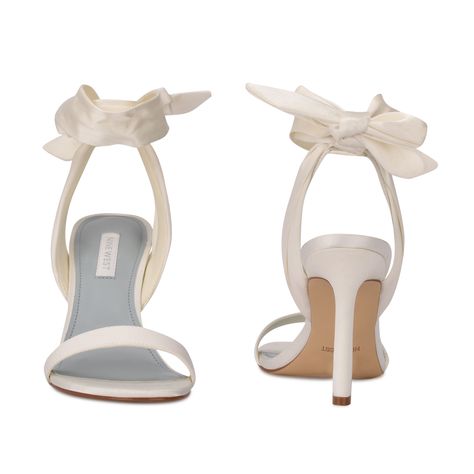 Step up your shoe game with the Nine West Kelsie dress sandal. This eye-catching style features a trendy sculpted high heel and soft textured fabric wraps around the ankle. Trendy yet chic the Kelsie sandal will elevate any outfit. Ankle Wrap Heels, Golden Trio, Wrap Heels, Shoe Inspo, Grad Dresses, Aesthetic Shoes, Ankle Wrap, Swag Shoes, Pretty Shoes