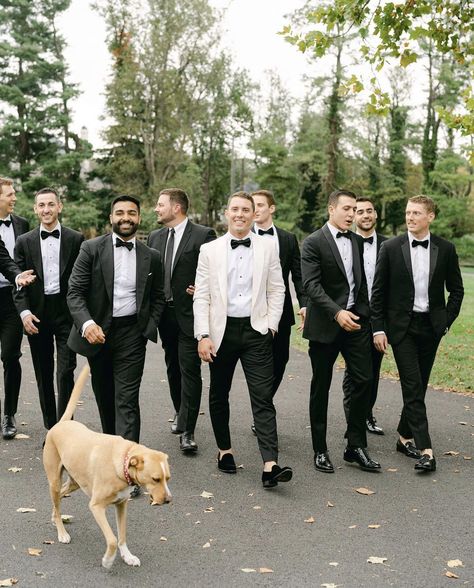 Tux Styles Wedding, Groomsmen In White Tuxedos, Ivory Bride And Groom Attire, Black And White Suit Wedding, White Tux Wedding Bride Groom, Groomsman Tux Ideas, Groomsmen Attire Classic, Groom In White Groomsmen In Black, Groom White Tuxedo With Groomsmen