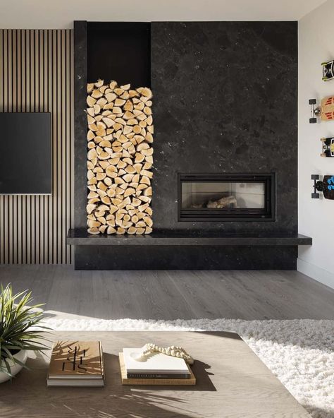 Black Fireplace Wall with Stacked Wood - Soul & Lane Fireplace Xmas Decor Ideas, Wallpaper For Fireplace, Fireplace Sconces, Black Fireplace Wall, Black Fireplace Surround, Black Electric Fireplace, Designer Homes, Wood Cocktail Table, Grey Wood Floors