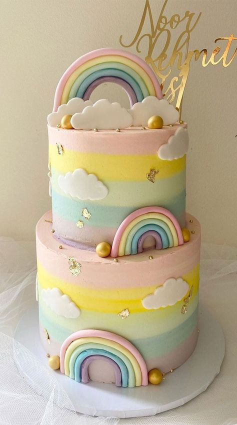 Two Tier Pastel Rainbow Cake, First Birthday Cake Pastel Colors, Pastel Rainbow Birthday Cake 2 Tier, Birthday Cake Rainbow Pastel, Pastel Cake Ideas Birthday Parties, Rainbow On Cake, Rainbow Theme Cake 1st Birthdays, 2 Tier Rainbow Cake, Pastel Rainbow Unicorn Cake