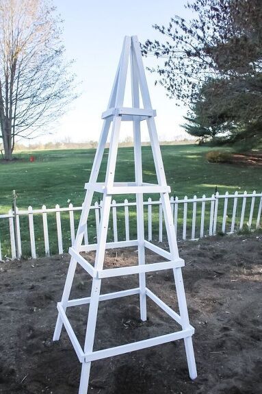 *Disclosure: This post is sponsored by Blue Ridge Tools.*Recently, my husband and I were exploring a local nursery here in New Hampshire (well, I was exploring and my husband was holding my plants!). I saw these tall, unfinished wood obelisks lined up and I ran over to look at them; I’ve always wanted to add one to my garden. I almost dropped when I saw the price tag… $130! After studying how it was put together I was confident that I could make one on my own for so much less so I adde… Build A Garden, Obelisk Trellis, Diy Garden Trellis, Garden Obelisk, Stone Planters, Better Homes And Garden, Garden Markers, Garden Trellis, Garden Fencing