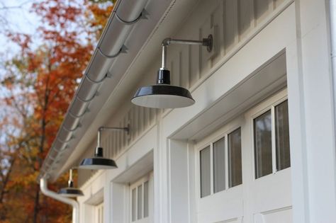 Barn Lighting Offers Authentic Feel in Modern Farmhouse | Blog | BarnLightElectric.com Garage Lights Exterior, Exterior Barn Lights, Garage Light Fixtures, Farmhouse Outdoor Lighting, Modern Farmhouse Porch, Farmhouse Dining Room Lighting, Modern Farmhouse Lighting, Barn Light Electric, Entry Lighting