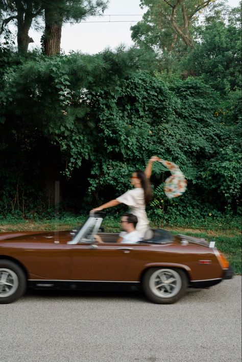 Vintage glam in a 1979 MG Midget by Rebecca Oswald Photography. Vintage Car Shoot Photography, Driving Convertible Aesthetic, Convertible Photoshoot Ideas, Vintage Car Photos, Vintage Convertible Photoshoot, Convertible Car Photoshoot, Old School Engagement Photos, Couple In Convertible, Travel Aesthetic Vintage