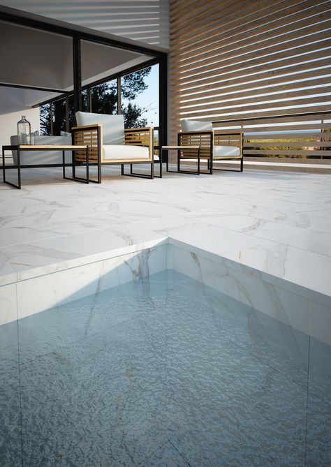 Today we bring you a different design option for your terrace or porche. If you love marble effect ceramic tiles more than stones, our #Calacatta series is perfect! Terrace Flooring Ideas, Calacatta Floor, Terrace Flooring, Pool Border, Pool Waterline Tile, Pool Deck Tile, Marble Pool, Pool Waterline, Waterline Tile