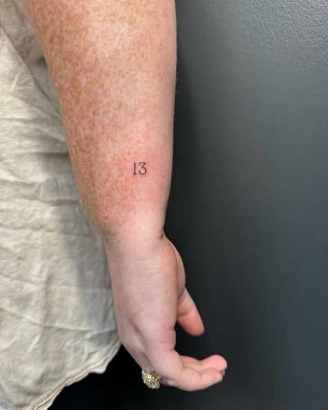 Fine line tattoo, tiny tattoo, script tattoo, number tattoo Tiny Number Tattoo Placement, Eleven Tattoo Number, Fine Line Tattoo Numbers, Tattoo 13 Number Design, Number 13 Tattoo, Number Tattoo Placement, Number 13 Tattoos, Tattoo Number, Tattoo Tiny