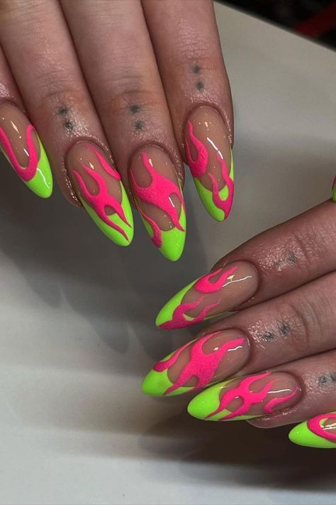 These almond-shaped nails by @giangnail.ie feature a unique combination of green French tips and striking pink flame nail art, creating a bold and stylish statement. Get inspired with 25 bold and vibrant neon nail ideas on Nailustrous to make your manicure pop this summer! Tattoos About Family, Neon Nail Ideas, Neon Ideas, Tattoo Nails, Flame Nail Art, Pink Tip Nails, Neon Nail Designs, Neon Green Nails, Blue Rose Tattoos