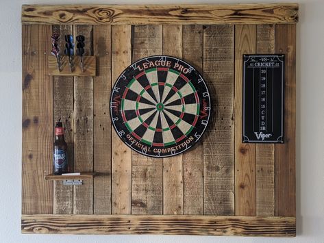 Home made dart board backer.all pallet wood Inside Dart Board, Dart Board Area Ideas, Garage Dart Board Ideas, Dart Board Surround Ideas, Dartboard Surround Diy, Pallet Dart Board Wall, Dart Board Surround, Diy Dartboard Backboard, Dart Board Wall Diy